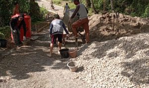 Pembangunan Jalan di Desa Gunung Tiga II Tingkatkan Infrastruktur dan Ekonomi Lokal